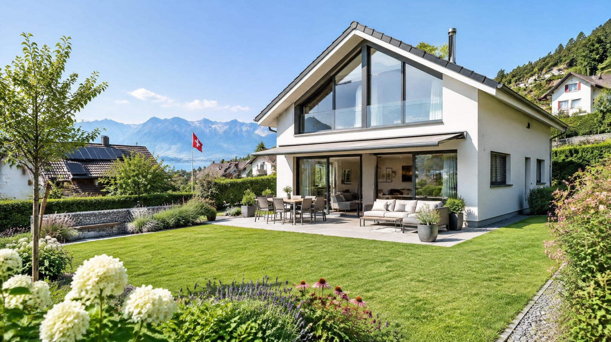Modern house with large windows in a green Swiss residential area