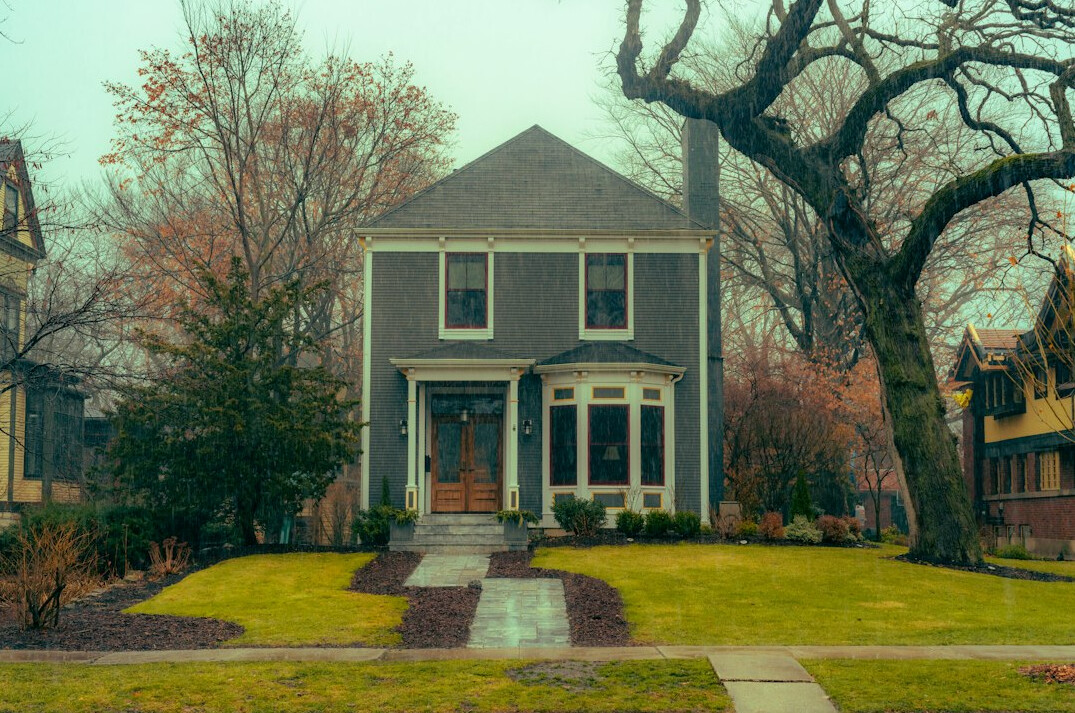 house with insurance documents